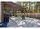 Spacious backyard with a pergola and patio, ideal for outdoor entertaining and relaxation, enhanced by lush greenery at 467 Nelliefield Trl, Wando, SC 29492