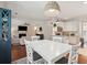 Bright dining area with views of the kitchen and living area at 467 Nelliefield Trl, Wando, SC 29492