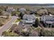 Aerial view of a large house with lush greenery surrounding the marsh at 4922 Sound View Dr, Mount Pleasant, SC 29466