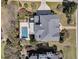 Aerial view of the home with a pool, lush landscaping, and a spacious backyard at 4922 Sound View Dr, Mount Pleasant, SC 29466