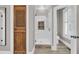 Elegant bathroom with a walk-in shower, stylish cabinet, and shuttered windows at 4922 Sound View Dr, Mount Pleasant, SC 29466