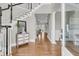 Grand foyer with hardwood floors, staircase, and view into the living room; offers a welcoming entrance at 4922 Sound View Dr, Mount Pleasant, SC 29466
