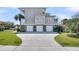 View of a three car garage with a backyard space at 4922 Sound View Dr, Mount Pleasant, SC 29466