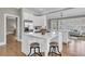 Modern kitchen with a large center island, stainless steel appliances, and connection to the living area at 4922 Sound View Dr, Mount Pleasant, SC 29466