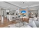 Open-concept living area with modern finishes and bar seating at 4922 Sound View Dr, Mount Pleasant, SC 29466