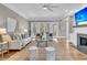 Spacious living room with access to the outdoor balcony at 4922 Sound View Dr, Mount Pleasant, SC 29466