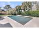 A beautiful swimming pool surounded by greenery at 4922 Sound View Dr, Mount Pleasant, SC 29466