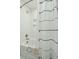 Clean bathroom with a white tiled shower and a decorative shower curtain for a fresh and inviting space at 523 Coaxum Rd, Mount Pleasant, SC 29464