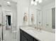 Bright bathroom with white marble countertop and dark vanity, offering a clean and modern design at 523 Coaxum Rd, Mount Pleasant, SC 29464