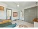Another view of the bedroom with decorative wall art and gray trim around the closet and passageway at 523 Coaxum Rd, Mount Pleasant, SC 29464