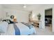Bedroom featuring a comfortable bed, a lounge chair, a wreath and a wooden dresser at 523 Coaxum Rd, Mount Pleasant, SC 29464