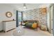 Charming bedroom with whimsical wallpaper, a cozy bed, and ample natural light, creating a serene space at 523 Coaxum Rd, Mount Pleasant, SC 29464