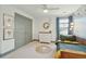 Charming bedroom with whimsical wallpaper and a dresser next to the window at 523 Coaxum Rd, Mount Pleasant, SC 29464