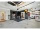 Large garage with epoxy flooring, well-organized storage, and a dedicated fitness area at 523 Coaxum Rd, Mount Pleasant, SC 29464