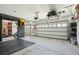 Spacious garage with high ceilings, multiple doors, and ample storage and workspace at 523 Coaxum Rd, Mount Pleasant, SC 29464