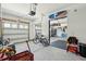 Well-equipped garage with multiple storage areas, workspace, and organized recreational equipment at 523 Coaxum Rd, Mount Pleasant, SC 29464