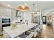 Modern kitchen featuring a spacious island with seating and stainless steel appliances at 523 Coaxum Rd, Mount Pleasant, SC 29464