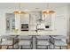 Modern kitchen with a large island, pendant lighting, and barstool seating at 523 Coaxum Rd, Mount Pleasant, SC 29464