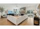 Bright open-concept living room with fireplace, hardwood floors, and comfortable seating at 523 Coaxum Rd, Mount Pleasant, SC 29464