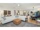 Spacious open-concept living space connecting kitchen, dining, and living areas with hardwood floors at 523 Coaxum Rd, Mount Pleasant, SC 29464