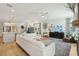 Open-concept living space including kitchen, dining area, and living room with hardwood floors at 523 Coaxum Rd, Mount Pleasant, SC 29464