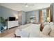 Bright main bedroom with contemporary decor, ensuite, and lots of natural light at 523 Coaxum Rd, Mount Pleasant, SC 29464