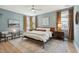 Serene bedroom with soft blue walls, natural light, and stylish modern furnishings at 523 Coaxum Rd, Mount Pleasant, SC 29464
