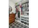 Spacious walk-in closet offers ample storage with custom shelving, drawers, and organized hanging space at 523 Coaxum Rd, Mount Pleasant, SC 29464