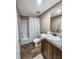 Bright bathroom featuring a shower-tub combo with tile surround and modern vanity at 532 Finlay Ln, Cottageville, SC 29435