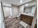 Bright bathroom with a shower-tub combo, modern vanity, and plenty of storage space at 532 Finlay Ln, Cottageville, SC 29435