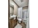 Well-lit bathroom with modern fixtures, vanity, and a shower-tub combination at 532 Finlay Ln, Cottageville, SC 29435