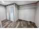 Spacious closet space with wood-look floors and wire shelving for optimal storage solutions at 532 Finlay Ln, Cottageville, SC 29435
