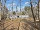 Home in a wooded lot surrounded by mature trees at 532 Finlay Ln, Cottageville, SC 29435