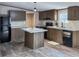 A kitchen featuring wooden cabinets, stainless steel appliances, and hardwood floors at 532 Finlay Ln, Cottageville, SC 29435
