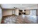 A spacious open-concept living room features hardwood flooring and neutral paint at 532 Finlay Ln, Cottageville, SC 29435