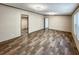 Spacious living room featuring hardwood floors, recessed lighting, large windows, and an attached bathroom at 532 Finlay Ln, Cottageville, SC 29435