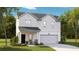 Charming two-story home featuring white siding, a covered porch with rocking chairs, and an attached garage at 577 Red Monarch Way, Moncks Corner, SC 29461