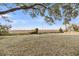 The backyard has an expansive lawn with a view of the waterway and marsh at 702 E Erie Ave, Folly Beach, SC 29439