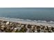 Quaint beachfront houses line the shore, offering direct beach access and stunning ocean views at 702 E Erie Ave, Folly Beach, SC 29439
