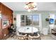 Inviting dining room with a round table and an outdoor view at 702 E Erie Ave, Folly Beach, SC 29439