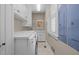 Laundry room featuring modern washer and dryer, sink with ample counter space at 707 Ocean Blvd, Isle of Palms, SC 29451