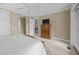 The main bedroom boasts carpeting, ceiling fan, and an additional room nearby at 707 Ocean Blvd, Isle of Palms, SC 29451