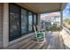 Relaxing porch with rocking chairs overlooking serene neighborhood views at 707 Ocean Blvd, Isle of Palms, SC 29451