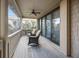 Relaxing screened-in porch with comfortable rocking chairs and peaceful outdoor views at 707 Ocean Blvd, Isle of Palms, SC 29451
