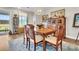Dining room with natural light, stylish furnishings, and a serene ambiance at 733 Spring Highlands Dr, Summerville, SC 29486