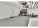 Clean, well-organized garage with storage shelves and ample space for parking and projects at 733 Spring Highlands Dr, Summerville, SC 29486