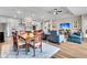 Open concept living space with a view of the kitchen, living, and dining area; seamless entertaining at 733 Spring Highlands Dr, Summerville, SC 29486