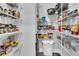 Well-organized pantry with wire shelving filled with various food items and storage containers at 733 Spring Highlands Dr, Summerville, SC 29486