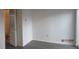 Bright bedroom with neutral walls, flooring, and bathroom access at 7851 Sandida Ct, North Charleston, SC 29418