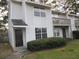 Charming townhouse with a well-maintained lawn and inviting curb appeal at 7851 Sandida Ct, North Charleston, SC 29418